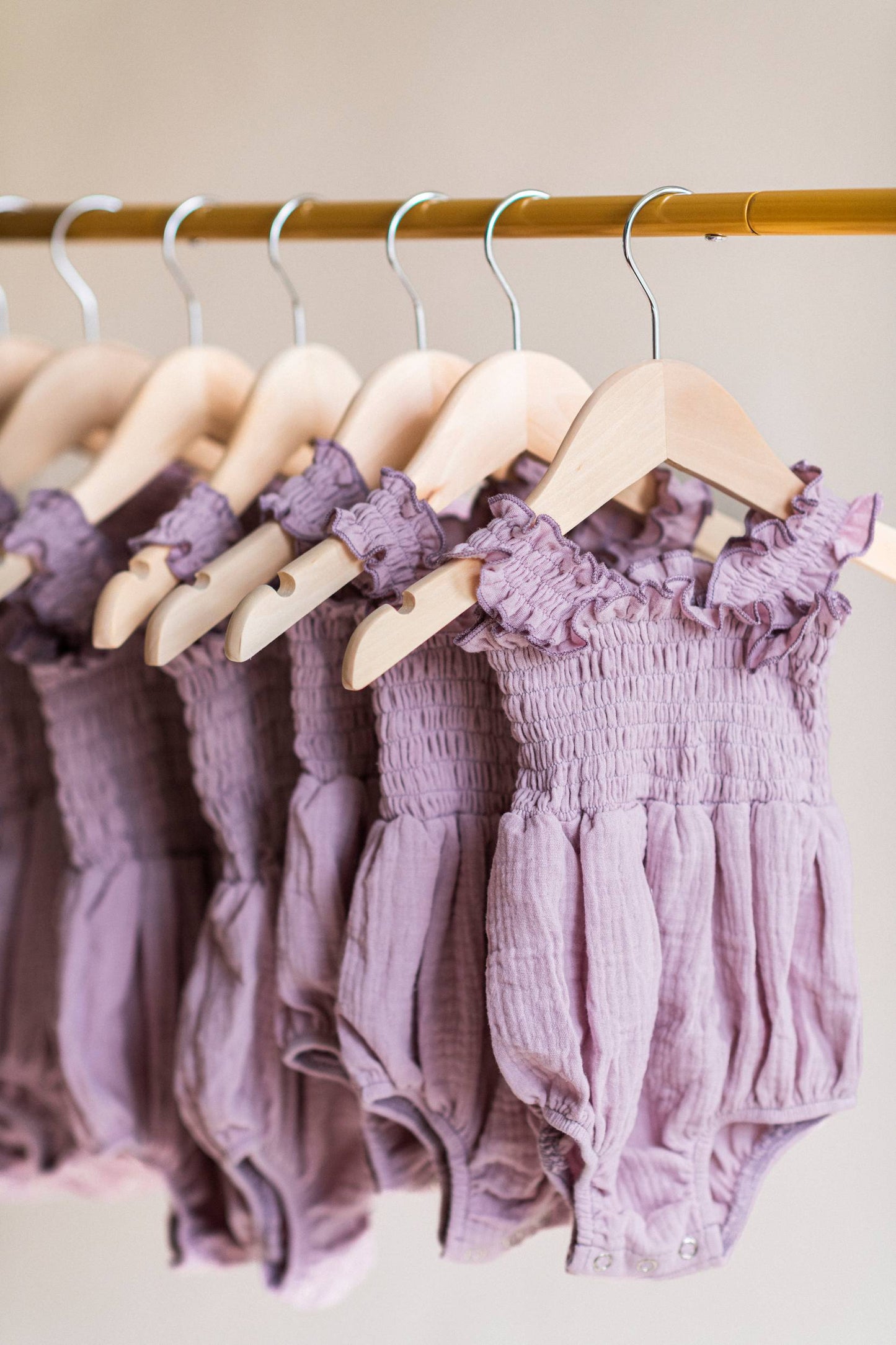 Smocked Ruffle Romper – Lilac Muslin